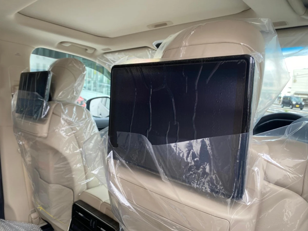 Rear entertainment screen and passenger cabin in the Bronze LC300 ZX