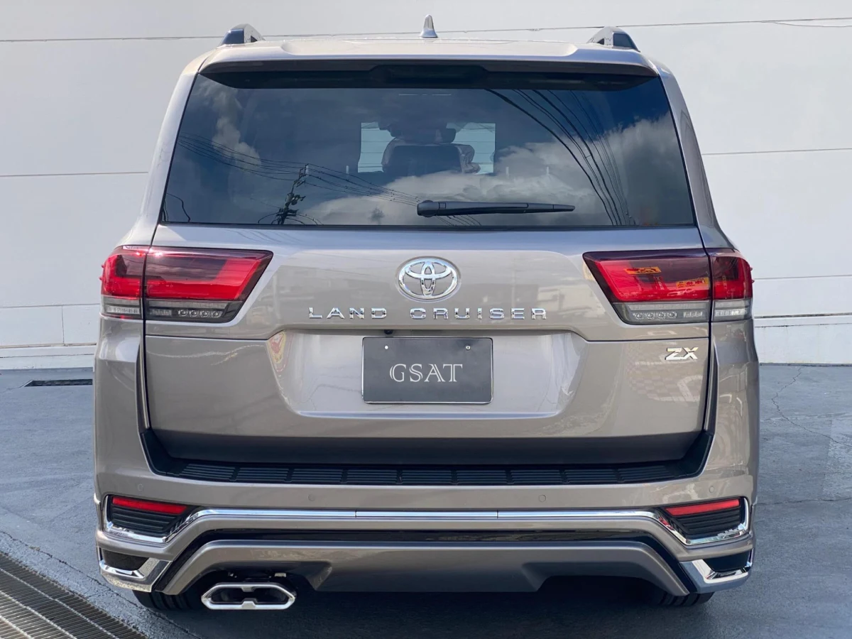 Rear exterior of the Bronze 2026 Land Cruiser 300 ZX