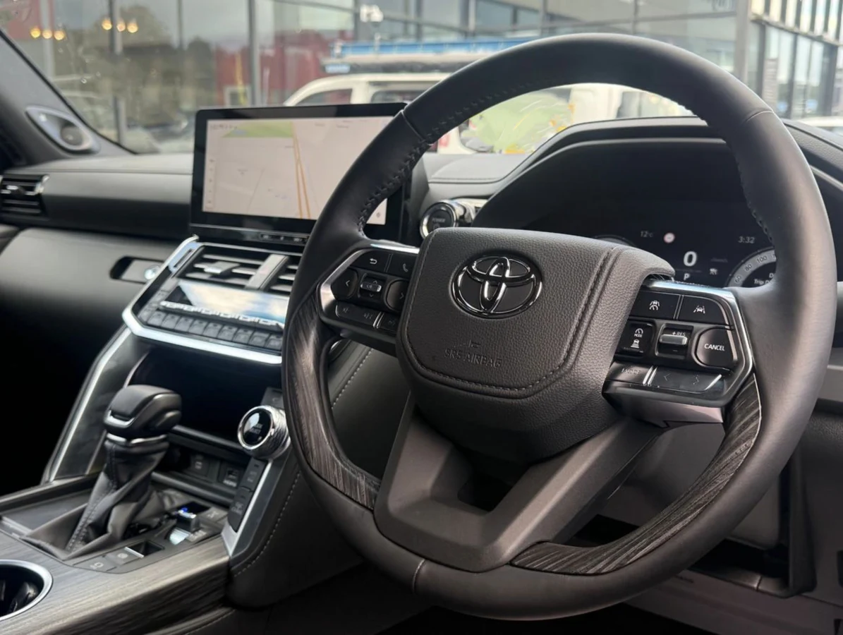 Right-hand-drive cockpit of the LC300 Performance Hybrid Sahara ZX
