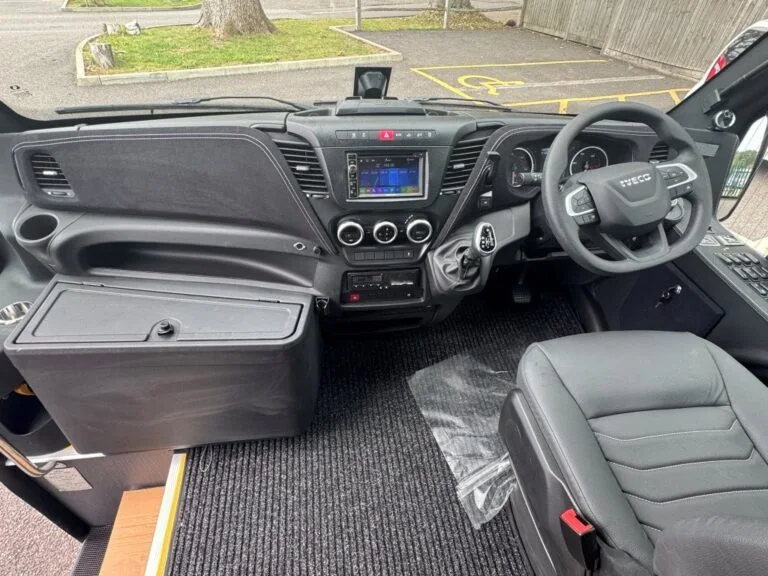 Driver area and front passenger seat in the Erener Revolution