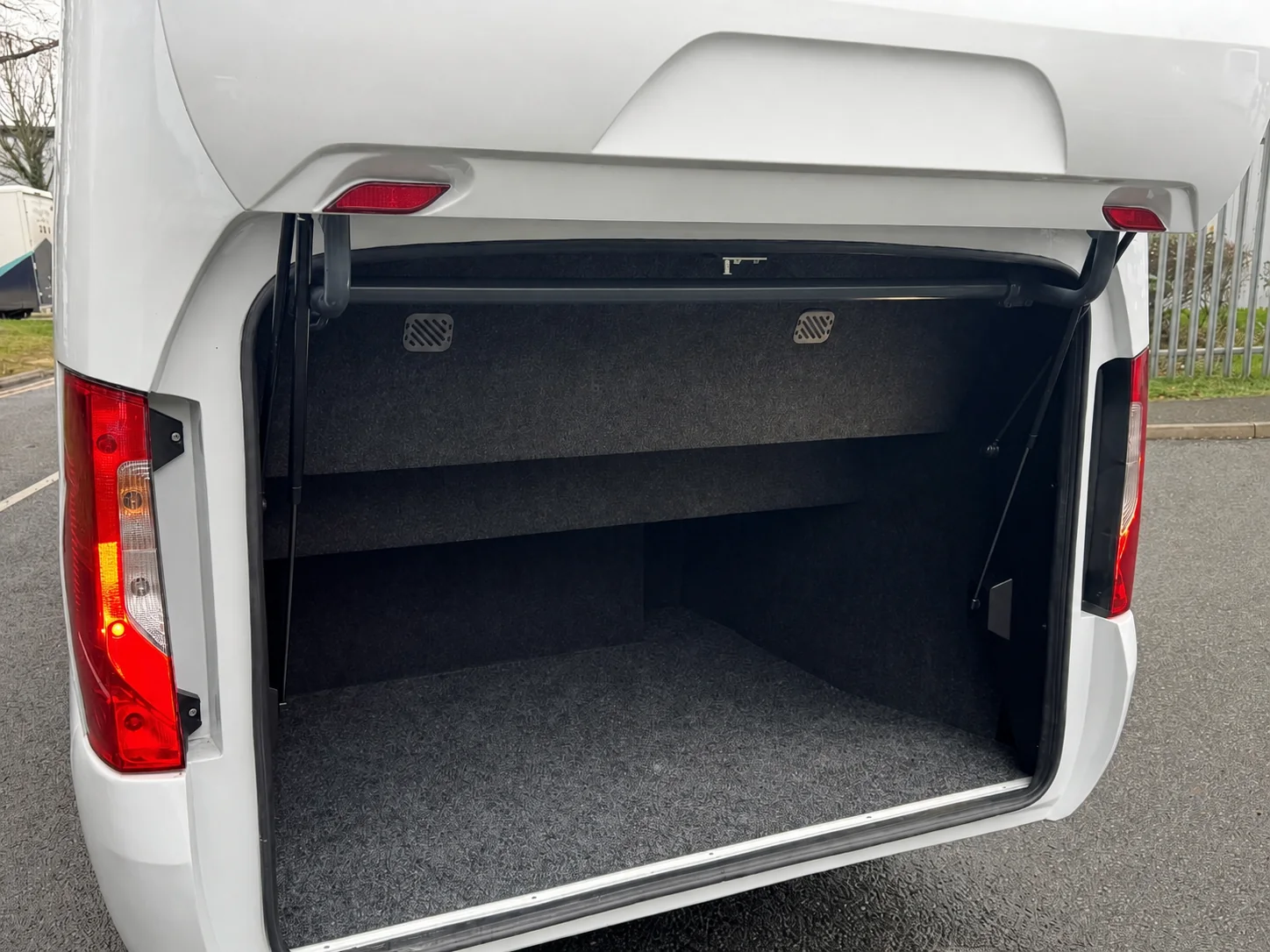 Open full-depth rear luggage boot on the Ferqui Sunset