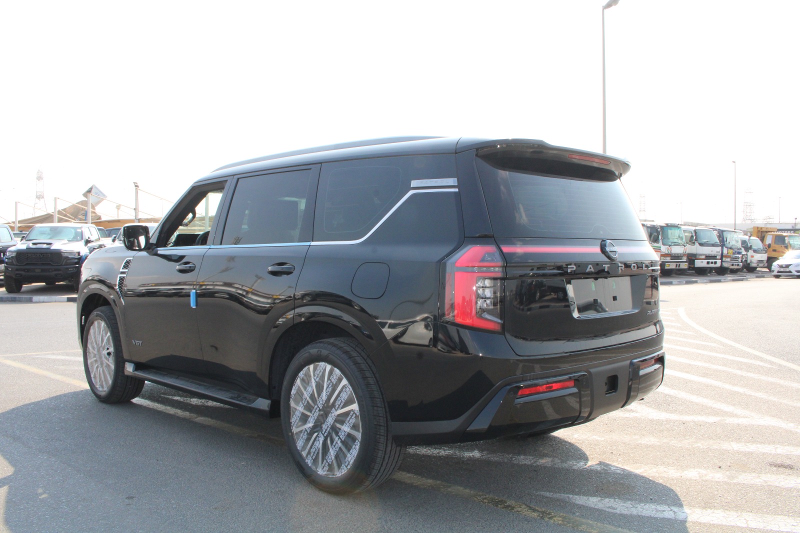 2026 Nissan Patrol Y63 LE Platinum City / 3.5L 4WD LHD / Black - Tan for export from Japan