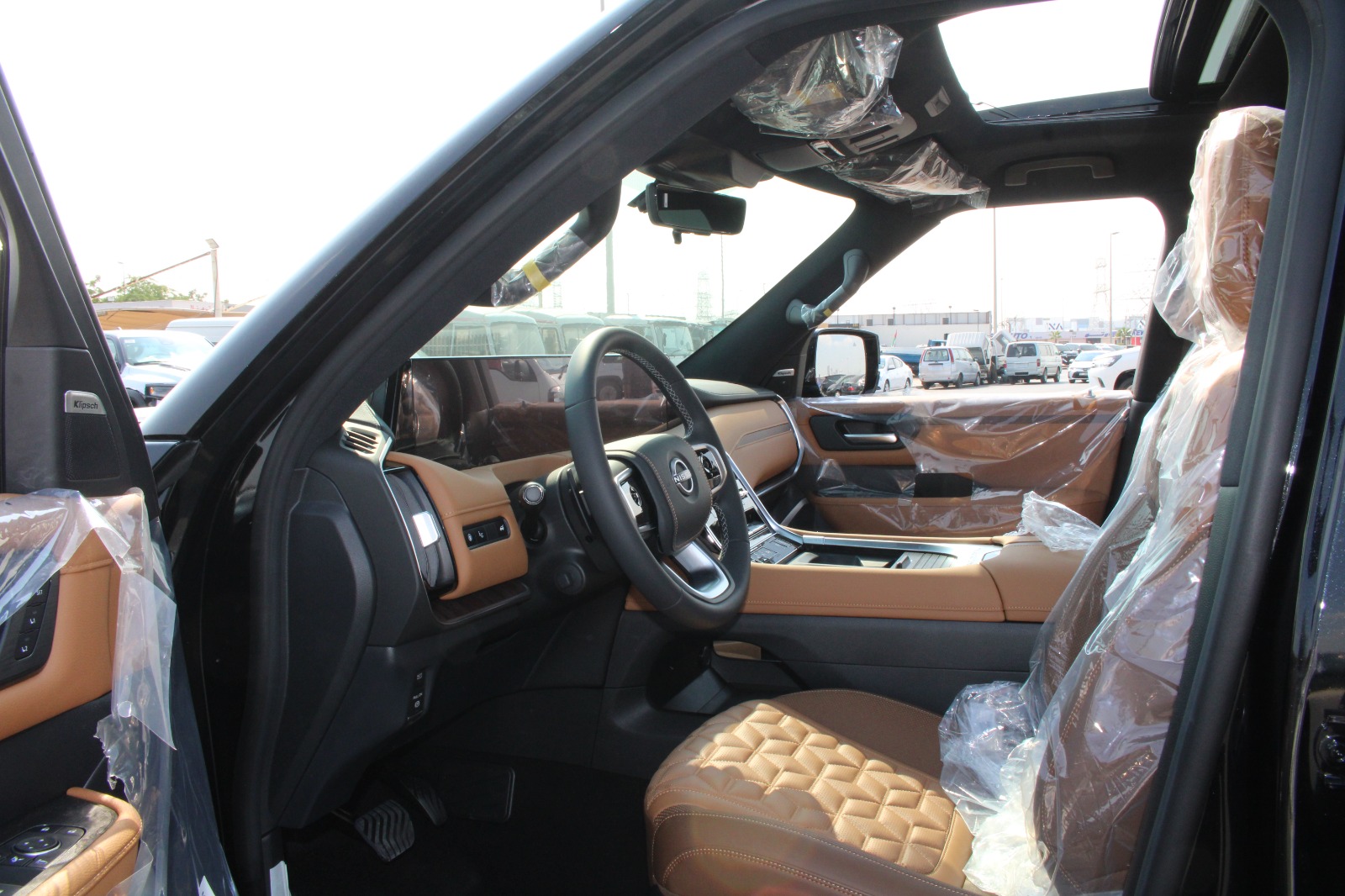 2026 Nissan Patrol Y63 LE Platinum City / 3.5L 4WD LHD / Black - Tan for export from Japan