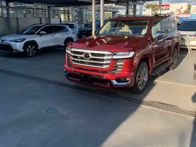 2022 Toyota Land Cruiser LC300 Sahara ZX Red Diesel (No.J0748) for export from Japan