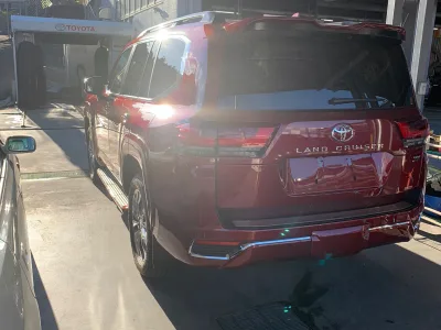 2022 Toyota Land Cruiser LC300 Sahara ZX Red Diesel (No.J0748) for export from Japan
